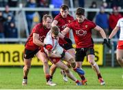 12 January 2020; Conall Grimes of Tyrone in action against Darren O'Hagan, Barry O'Hagan and Conor Poland of Down during the Bank of Ireland Dr McKenna Cup Semi-Final match between Tyrone and Down at the Athletic Grounds in Armagh. Photo by Oliver McVeigh/Sportsfile