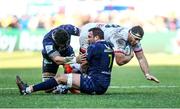 11 January 2020; Marcell Coetzee of Ulster is tackled by Sitaleki Timani and Alexandre Lapandry of ASM Clermont Auvergne during the Heineken Champions Cup Pool 3 Round 5 match between ASM Clermont Auvergne and Ulster at Stade Marcel-Michelin in Clermont-Ferrand, France. Photo by John Dickson/Sportsfile