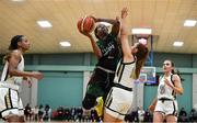 12 January 2020; Lauren Grigsby of Trinity Meteors goes for a lay up despite the efforts of Aoife Callaghan of Ulster University during the Hula Hoops Women's Division One National Cup Semi-Final between Ulster University and Trinity Meteors at Parochial Hall in Cork. Photo by Sam Barnes/Sportsfile