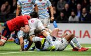 12 January 2020; Chris Farrell of Munster is held up by Hassane Kolingar of Racing 92 on the try line during the Heineken Champions Cup Pool 4 Round 5 match between Racing 92 and Munster at Paris La Defence Arena in Paris, France. Photo by Seb Daly/Sportsfile
