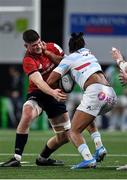12 January 2020; Jack O’Donoghue of Munster tackles Teddy Thomas of Racing 92 during the Heineken Champions Cup Pool 4 Round 5 match between Racing 92 and Munster at Paris La Defence Arena in Paris, France. Photo by Seb Daly/Sportsfile