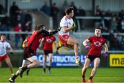 12 January 2020; Conall McCann of Tyrone in action against Kevin McKernan and Daniel Guinness of Down during the Bank of Ireland Dr McKenna Cup Semi-Final match between Tyrone and Down at the Athletic Grounds in Armagh. Photo by Oliver McVeigh/Sportsfile