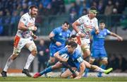 18 January 2020; Luke McGrath of Leinster is tackled by Jayden Hayward of Benetton during the Heineken Champions Cup Pool 1 Round 6 match between Benetton and Leinster at the Stadio Comunale di Monigo in Treviso, Italy. Photo by Ramsey Cardy/Sportsfile