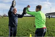 18 January 2020; Galway Goalkeeping coach Martin McNamara warms up goalkeeper Ronan O'Beolain before the Connacht FBD League Final between Roscommon and Galway at Dr. Hyde Park in Roscommon. Photo by Ray Ryan/Sportsfile