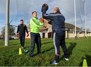 18 January 2020; Galway Goalkeeping coach Martin McNamara warms up goalkeeper Ronan O'Beolain before the Connacht FBD League Final between Roscommon and Galway at Dr. Hyde Park in Roscommon. Photo by Ray Ryan/Sportsfile