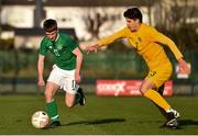 18 January 2020; Adam Lennon of Republic of Ireland in action against Jack McLoughlin of Australia during the U18 Schools International Friendly between Republic of Ireland and Australia at Home Farm, Whitehall in Dublin. Photo by Ben McShane/Sportsfile