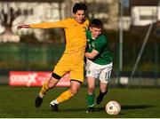 18 January 2020; Adam Lennon of Republic of Ireland in action against Jack McLoughlin of Australia during the U18 Schools International Friendly between Republic of Ireland and Australia at Home Farm, Whitehall in Dublin. Photo by Ben McShane/Sportsfile