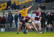 18 January 2020; Sean Mulkerrin of Galway in action against Ciaran Lennon of Roscommon during the Connacht FBD League Final between Roscommon and Galway at Dr. Hyde Park in Roscommon. Photo by Ray Ryan/Sportsfile