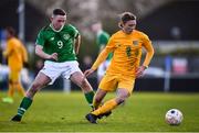 18 January 2020; Sasha Kuevski of Australia in action against Kyle Robinson of Republic of Irelandduring the U18 Schools International Friendly between Republic of Ireland and Australia at Home Farm, Whitehall in Dublin. Photo by Ben McShane/Sportsfile