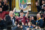 18 January 2020; Gerry McGovern President Connacht Council presents Shane Walsh of Galway presents the FBD cup after the Connacht FBD League Final between Roscommon and Galway at Dr. Hyde Park in Roscommon. Photo by Ray Ryan/Sportsfile