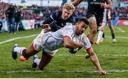 18 January 2020; Robert Baloucoune of Ulster dives over to score his side's second try despite the efforts of Ollie Fox of Bath during the Heineken Champions Cup Pool 3 Round 6 match between Ulster and Bath at Kingspan Stadium in Belfast. Photo by John Dickson/Sportsfile