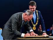 18 January 2020; Former Dublin GAA football team manager Jim Gavin signs the Roll of Honour, as Lord Mayor of Dublin Paul McAuliffe looks on, at the Conferring of the Honorary Freedom of Dublin City on Jim Gavin ceremony in the Round Room at the Mansion House, in Dawson St, Dublin. Photo by Ray McManus/Sportsfile