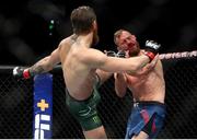 18 January 2020; Conor McGregor lands a kick on Donald Cerrone during their UFC 246 Welterweight bout at the T-Mobile Arena in Las Vegas, Nevada, USA. Photo by Mark J. Rebilas / USA TODAY Sports via Sportsfile