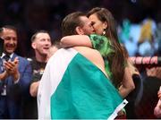 18 January 2020; Conor McGregor celebrates with partner Dee Devlin following his UFC 246 Welterweight bout victory over Donald Cerrone at the T-Mobile Arena in Las Vegas, Nevada, USA. Photo by Mark J. Rebilas / USA TODAY Sports via Sportsfile