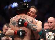 18 January 2020; Conor McGregor and Donald Cerrone following their UFC 246 Welterweight bout at the T-Mobile Arena in Las Vegas, Nevada, USA. Photo by Mark J. Rebilas / USA TODAY Sports via Sportsfile