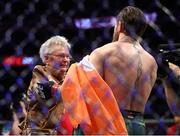 18 January 2020; Jerry Cerrone, grandmother of Donald Cerrone meets with Conor McGregor following his UFC 246 Welterweight bout victory over Donald Cerrone at the T-Mobile Arena in Las Vegas, Nevada, USA. Photo by Mark J. Rebilas / USA TODAY Sports via Sportsfile