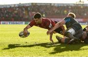 19 January 2020; Conor Murray of Munster scores his side's third try despite the efforts of Dan Baker of Ospreys during the Heineken Champions Cup Pool 4 Round 6 match between Munster and Ospreys at Thomond Park in Limerick. Photo by Diarmuid Greene/Sportsfile