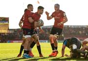 19 January 2020; Conor Murray of Munster is congratulated by team-mates Peter O'Mahony, Dan Goggin and Fineen Wycherley after scoring his side's third try during the Heineken Champions Cup Pool 4 Round 6 match between Munster and Ospreys at Thomond Park in Limerick. Photo by Diarmuid Greene/Sportsfile
