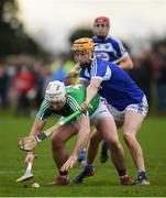 5 January 2020; Derek McNicholas of Westmeath in action against Ciaran Comerford of Laois during the 2020 Walsh Cup Round 1 match between Laois and Westmeath at O'Keeffe Park in Borris in Ossory, Laois. Photo by Ramsey Cardy/Sportsfile