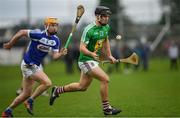 5 January 2020; Aonghus Clarke of Westmeath in action against Ciaran Comerford of Laois during the 2020 Walsh Cup Round 1 match between Laois and Westmeath at O'Keeffe Park in Borris in Ossory, Laois. Photo by Ramsey Cardy/Sportsfile