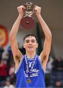 21 January 2020; St Flannan's College captain Kevin Nugent of lifts the cup after the Basketball Ireland U19 C Boys Schools Cup Final match between Ballymakenny College and St Flannan's College, Ennis at the National Basketball Arena in Tallaght, Dublin. Photo by Brendan Moran/Sportsfile