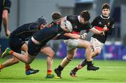 21 January 2020; Jake Hickey of The High School is tackled by Jordan O'Connor and Cillian Burke of Temple Carrig School during the Bank of Ireland Vinnie Murray Cup Semi-Final match between Temple Carrig School and The High School at Energia Park in Dublin. Photo by Sam Barnes/Sportsfile