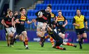 21 January 2020; Dan Walsh of The High School in action against Cian Hingerty and Thade Shanahan of Temple Carrig School  during the Bank of Ireland Vinnie Murray Cup Semi-Final match between Temple Carrig School and The High School at Energia Park in Dublin. Photo by Sam Barnes/Sportsfile