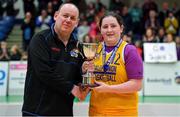 21 January 2020; St Joseph's captain Millie Byrne is presented with the cup by PJ Reidy of the Post Primary Schools Committee of Basketball Ireland after the Basketball Ireland U16 C Girls Schools Cup Final match between St Nathy's College and St Joseph's, Ballybunion at the National Basketball Arena in Tallaght, Dublin. Photo by Brendan Moran/Sportsfile