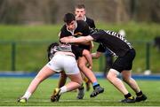 22 January 2020; Finn McNally of St. Patrick’s Classical School is tackled by Tom Bride, left, and Darragh Ashton of Ardscoil na Trionoide during the Bank of Ireland Father Godfrey Cup Quarter-Final match between Ardscoil na Trionoide and St. Patrick’s Classical School at Energia Park in Donnybrook, Dublin. Photo by Ben McShane/Sportsfile