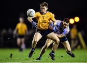 22 January 2020; Mícheál Bannigan of DCU Dóchas Éireann in action against Martin O'Connor of UCD during the Sigerson Cup Semi-Final match between DCU Dóchas Éireann and UCD at Dublin City University Sportsgrounds in Glasnevin, Dublin. Photo by Ben McShane/Sportsfile