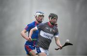 23 January 2020; Calum Lyons of Waterford United IT in action against Diarmuid Ryan of Mary Immaculate College during the Fitzgibbon Cup Group A Round 3 match between Mary Immaculate College and Waterford IT at MICL Grounds in Limerick. Photo by David Fitzgerald/Sportsfile