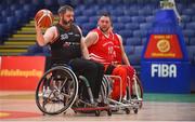 24 January 2020; Patrick Forbes of Killester WBC in action against Derek Hegarty of Rebel Wheelers during the Hula Hoops IWA Wheelchair Basketball Cup Final match between Killester WBC and Rebel Wheelers at the National Basketball Arena in Tallaght, Dublin. Photo by Daniel Tutty/Sportsfile
