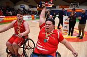 24 January 2020; Rebel Wheelers captain Jack Quinn, right, and vice captain Dylan McCarthy celebrate with the cup after the Hula Hoops IWA Wheelchair Basketball Cup Final match between Killester WBC and Rebel Wheelers at the National Basketball Arena in Tallaght, Dublin. Photo by Brendan Moran/Sportsfile
