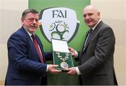 25 January 2020; Outgoing President of the FAI Donal Conway, left, presents President elect Gerry McAnaney with the Presidential Chain of Office during an FAI EGM at the Crowne Plaza Hotel in Blanchardstown in Dublin. Photo by Matt Browne/Sportsfile