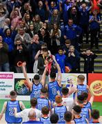 25 January 2020; Neptune players celebrate with the trophy following the Hula Hoops U18 Men’s National Cup Final between Neptune and Belfast Star at the National Basketball Arena in Tallaght, Dublin. Photo by Harry Murphy/Sportsfile