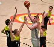 25 January 2020; Ciaran O’Sullivan of Tradehouse Central Ballincollig shoots a basket over Sean Broderick and Rolands Vaikuls of IT Carlow during the Hula Hoops President’s National Cup Final between IT Carlow Basketball and Tradehouse Central Ballincollig at the National Basketball Arena in Tallaght, Dublin. Photo by Brendan Moran/Sportsfile