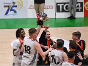25 January 2020; Tradehouse Central Ballincollig players celebrate with the trophy following the Hula Hoops President’s National Cup Final between IT Carlow Basketball and Tradehouse Central Ballincollig at the National Basketball Arena in Tallaght, Dublin. Photo by Harry Murphy/Sportsfile