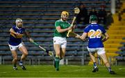 25 January 2020; Seamus Flanagan of Limerick scores a late point despite the efforts of Padraic Maher and Jamie Moloney of Tipperary during the Allianz Hurling League Division 1 Group A Round 1 match between Tipperary and Limerick at Semple Stadium in Thurles, Tipperary. Photo by Diarmuid Greene/Sportsfile