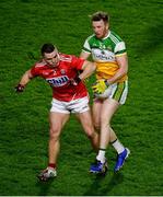 25 January 2020; Ronan McEvoy of Offaly in action against Sean Powter of Cork during the Allianz Football League Division 3 Round 1 match between Cork and Offaly at Páirc Ui Chaoimh in Cork. Photo by David Fitzgerald/Sportsfile