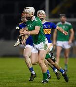 25 January 2020; A hurleyless Cian Lynch of Limerick gets away from Craig Morgan of Tipperary during the Allianz Hurling League Division 1 Group A Round 1 match between Tipperary and Limerick at Semple Stadium in Thurles, Tipperary. Photo by Diarmuid Greene/Sportsfile