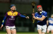 25 January 2020; Jack Kelly of Laois in action against Kevin Foley of Wexford during the Allianz Hurling League Division 1 Group B Round 1 match between Laois and Wexford at MW Hire O'Moore Park in Portlaoise, Co Laois. Photo by Michael P Ryan/Sportsfile