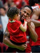 25 January 2020; Puff Summers of Griffith College Templeogue celebrates with his daughter Kennedy Summers, aged three, following the Hula Hoops Pat Duffy National Cup Final between DBS Éanna and Griffith College Templeogue at the National Basketball Arena in Tallaght, Dublin. Photo by Harry Murphy/Sportsfile