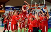 25 January 2020; Lorcan Murphy of Griffith College Templeogue celebrates with his team-mates after being named MVP after the Hula Hoops Pat Duffy National Cup Final between DBS Éanna and Griffith College Templeogue at the National Basketball Arena in Tallaght, Dublin. Photo by Brendan Moran/Sportsfile