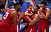 25 January 2020; Puff Summers of Griffith College Templeogue, right, celebrates with his daughter Kennedy, age 3, and team-mat eDarren Townes of Griffith College Templeogue after the Hula Hoops Pat Duffy National Cup Final between DBS Éanna and Griffith College Templeogue at the National Basketball Arena in Tallaght, Dublin. Photo by Brendan Moran/Sportsfile