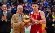 25 January 2020; Lorcan Murphy of Griffith College Templeogue is presented with the MVP by Sport ireland CEO John Treacy after the Hula Hoops Pat Duffy National Cup Final between DBS Éanna and Griffith College Templeogue at the National Basketball Arena in Tallaght, Dublin. Photo by Brendan Moran/Sportsfile