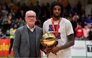 25 January 2020; Andre Nation of Tradehouse Central Ballincollig is presented with the MVP by Bill McCourt of the MNC, after the Hula Hoops President’s National Cup Final between IT Carlow Basketball and Tradehouse Central Ballincollig at the National Basketball Arena in Tallaght, Dublin. Photo by Brendan Moran/Sportsfile