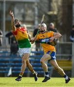 26 January 2020; Ross Smithers of Carlow in action against Ryan Taylor of Clare during the Allianz Hurling League Division 1 Group B Round 1 match between Clare and Carlow at Cusack Park in Ennis, Clare. Photo by Diarmuid Greene/Sportsfile