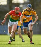 26 January 2020; David Fitzgerald of Clare in action against Edward Byrne of Carlow during the Allianz Hurling League Division 1 Group B Round 1 match between Clare and Carlow at Cusack Park in Ennis, Clare. Photo by Diarmuid Greene/Sportsfile