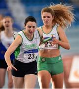 26 January 2020; Lorraine Delaney of Craughwell AC, Galway, left, receives the baton from team-mate Laura Cunningham as they compete in the Women's 4x200m event during the AAI National Indoor League Round 2 at AIT Indoor Arena in Athlone, Westmeath. Photo by Ben McShane/Sportsfile
