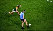 25 January 2020; Brian Fenton of Dublin kicks a first half point under pressure from Gavin O'Brien of Kerry during the Allianz Football League Division 1 Round 1 match between Dublin and Kerry at Croke Park in Dublin. Photo by Ray McManus/Sportsfile